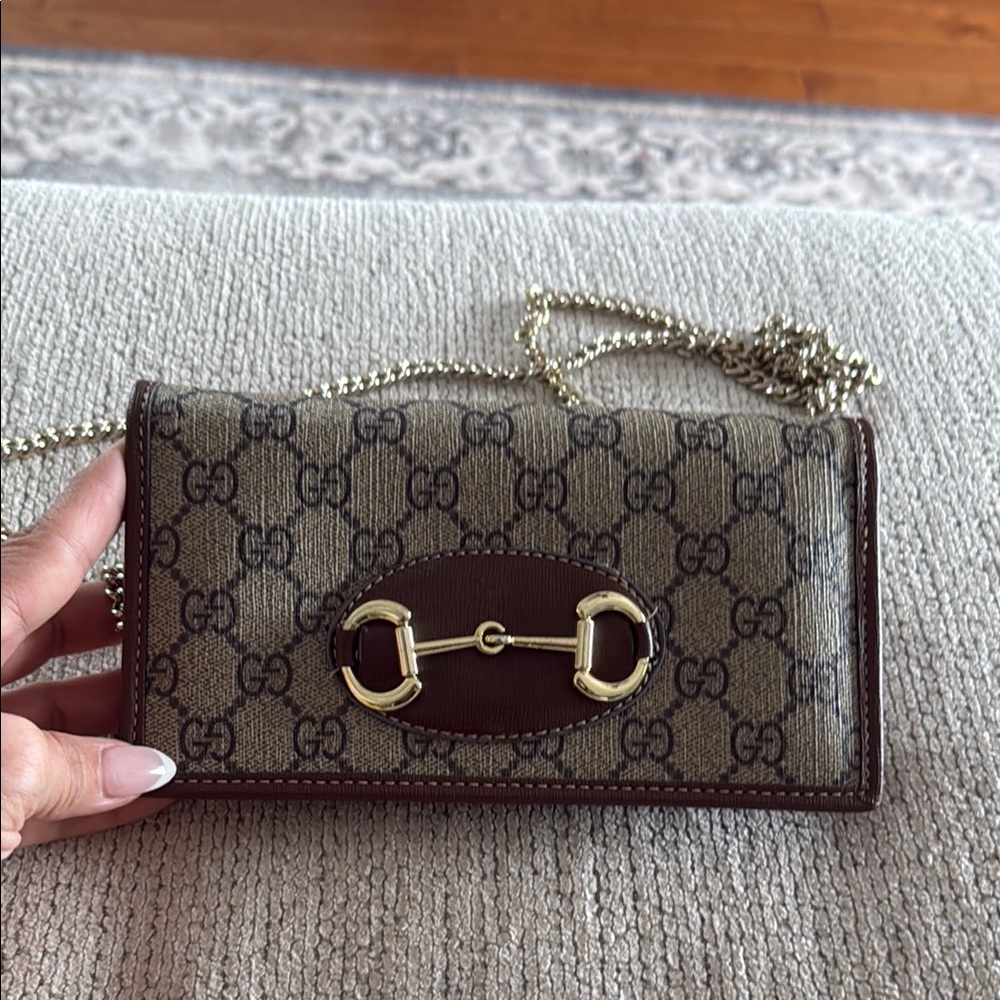 Brown Crossbody Bag with Monogram Pattern and Gold Hardware